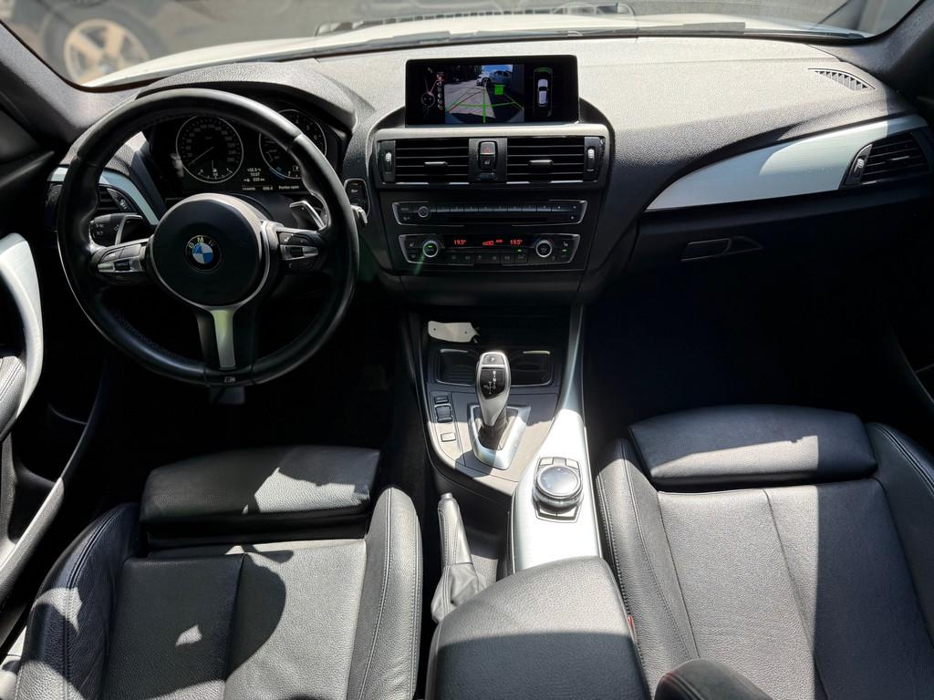 BMW 1-serie M135i xDrive High Executive l Schuifdak l Volled, Auto's, Lichtsensor, Gebruikt, 320 pk, Wit
