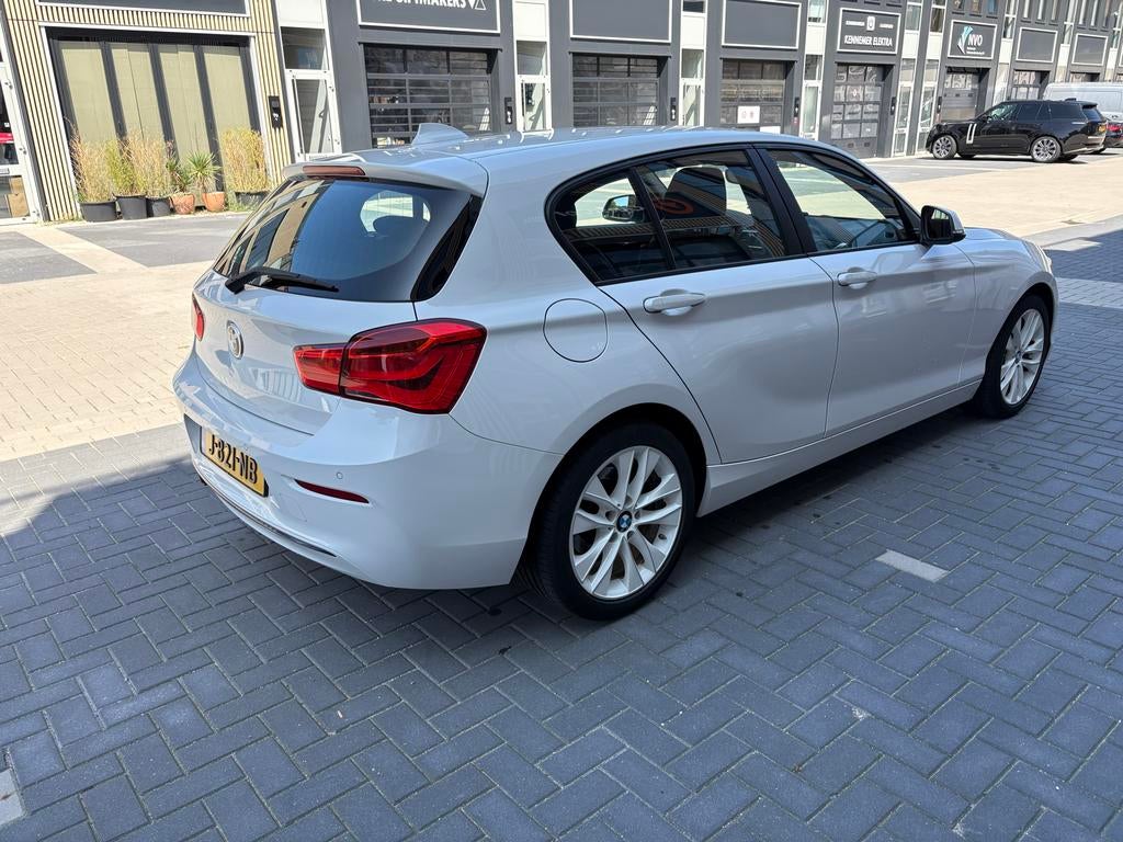 BMW 1-Serie 118i 136pk Aut 2017 Wit, Auto's, BMW, Particulier, 1-Serie, Benzine, B, Hatchback, Automaat, Geïmporteerd, Wit, Achterwielaandrijving