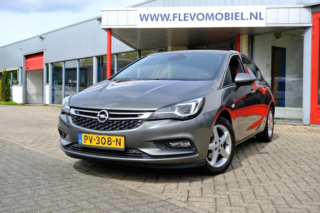 Opel Astra 1.0 Innovation 5-drs Navi|1e Eig|Half Leder|Clima, Auto's, Opel, Gebruikt, Euro 6, 610 kg, 23 km/l