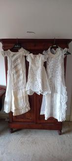 3 antieke doopjurken en een doopkleed, Ophalen