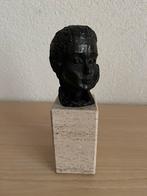 Bronzen beeld, Ophalen