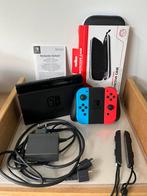 Nintendo Switch Rood/Blauw, Spelcomputers en Games, Spelcomputers | Nintendo Switch, Ophalen, Zo goed als nieuw, Met 1 controller