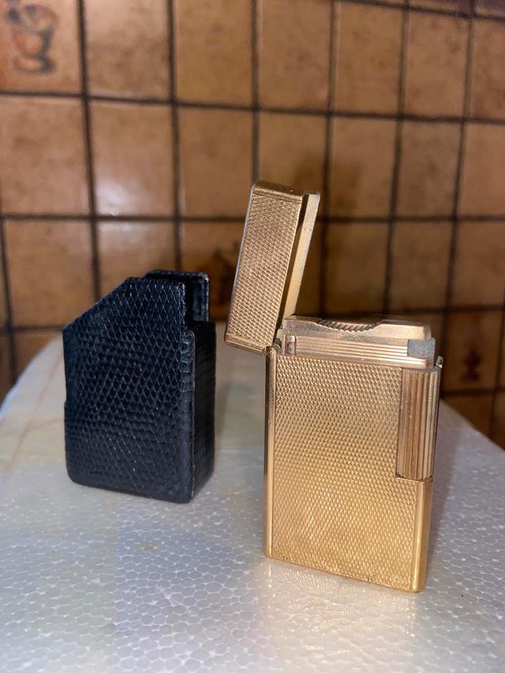 S.T DUPONT VINTAGE LIGNE 1,1968 VERGULD,weekend prijs 150€, Verzamelen, Rookartikelen, Aanstekers en Luciferdoosjes, Zo goed als nieuw