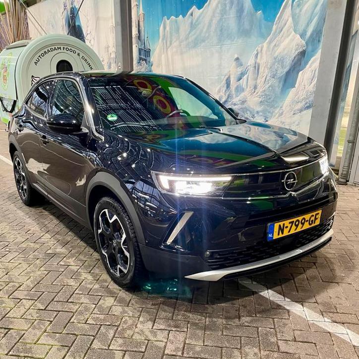 Opel Mokka E Ultimate 50kWh 136pk 2021 Zwart, Auto's, Opel, Particulier, Mokka, Elektrisch, SUV of Terreinwagen, Automaat, Origineel Nederlands
