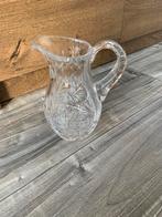 Kristallen kan met handvat, Ophalen