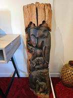 Houten olifanten op stam, Ophalen