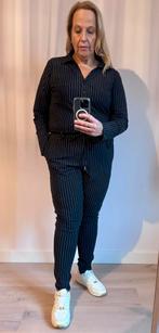 Zwart-wit gestreepte jumpsuit maat XL, Kleding | Dames, Jumpsuits, Ophalen of Verzenden, Zo goed als nieuw, Maat 46/48 (XL) of groter