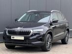 Skoda Karoq 1.5 TSi 150pk Automaat Business Edition Plus, Auto's, Stof, 1498 cc, 700 kg, Zwart