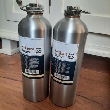 2 Briljant Baby kruiken, met 2 hema kruikenzakken beschikbaar voor biedingen
