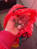 Zak vol met knikkers, Ophalen