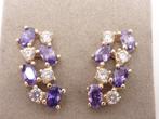 Gouden oorknopjes met zirkonia                           G74, Gebruikt, ., Paars, Ophalen of Verzenden