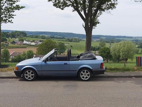Ford Escort 1.6 Ghia Cabrio 1987 Blauw, Auto's, Ford, Particulier, Escort, Bluetooth, Centrale vergrendeling, Lichtmetalen velgen