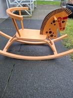 Houten hobbelpaard, Ophalen