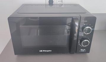 Microwave in good condition beschikbaar voor biedingen