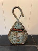 Zware oude katrol, Ophalen