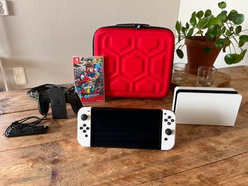 Nintendo Switch OLED + Mario Odyssey en accessoires beschikbaar voor biedingen