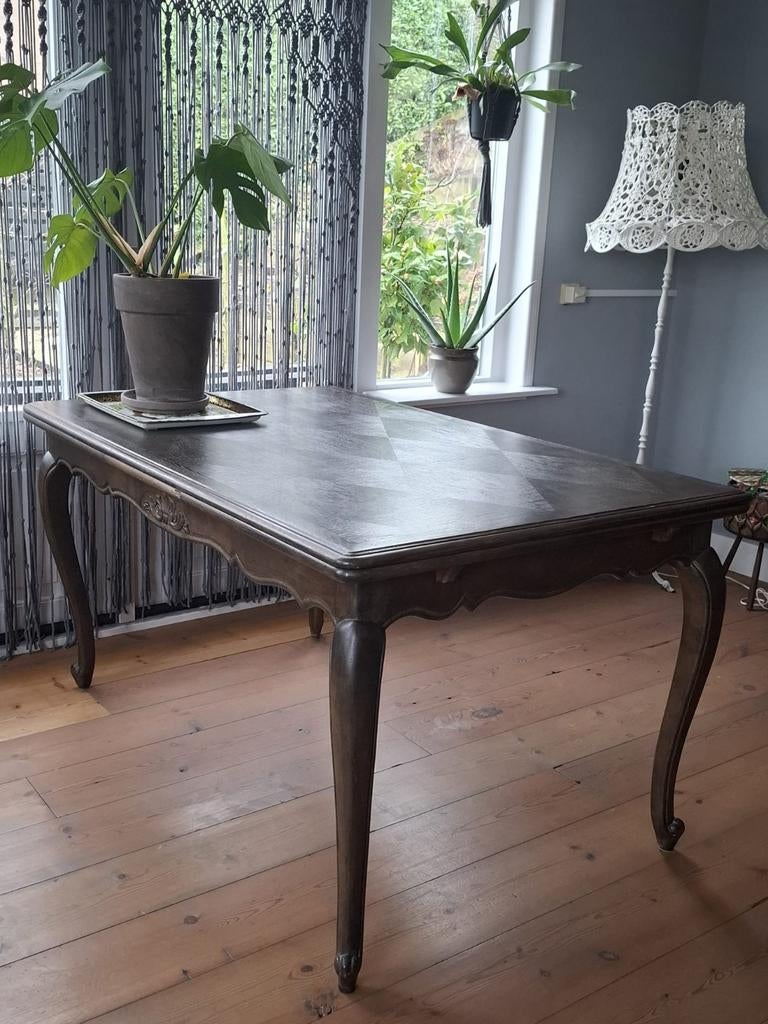 Grote uitschuifbare eettafel, Ophalen