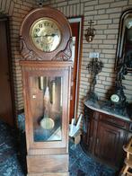 Duitse staande klok, Ophalen