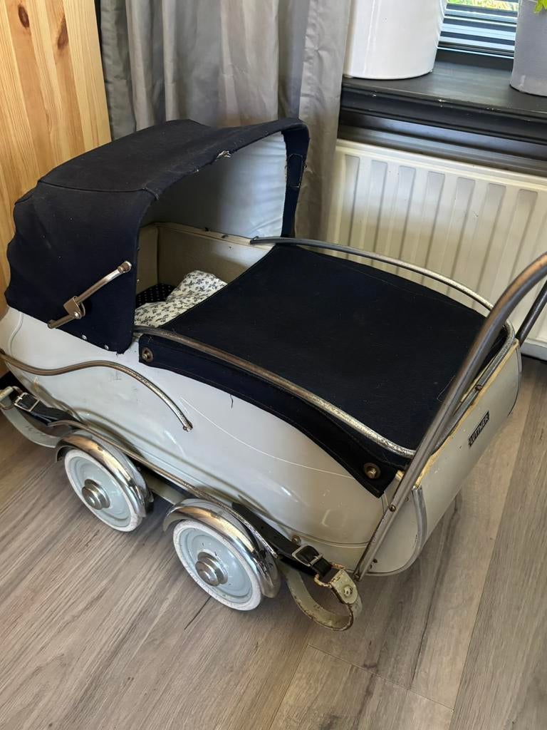 Oude poppenwagen, Ophalen, Gebruikt