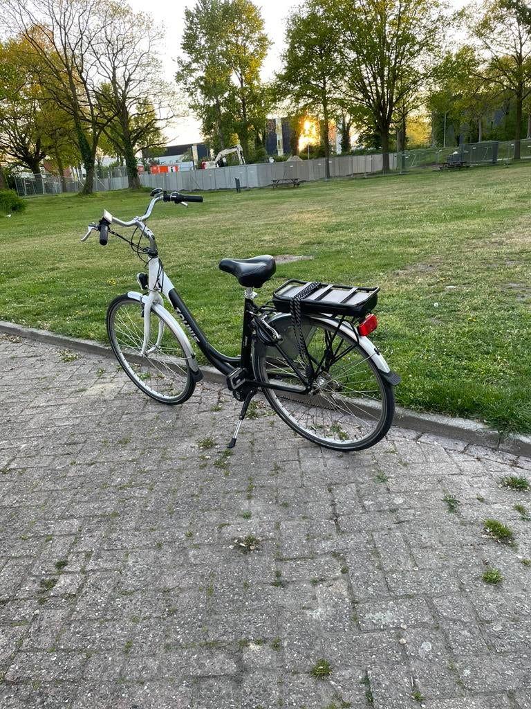 Tounis E-bike Damesfiets - Zo goed als nieuw, Fietsen en Brommers, Elektrische fietsen, Zo goed als nieuw, 47 tot 51 cm, 30 tot 50 km per accu