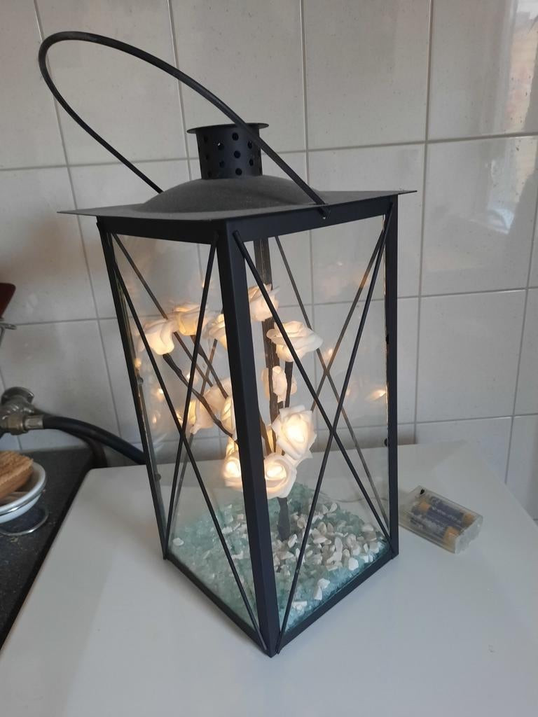 Lantaarn met verlichting op batterijen, Ophalen