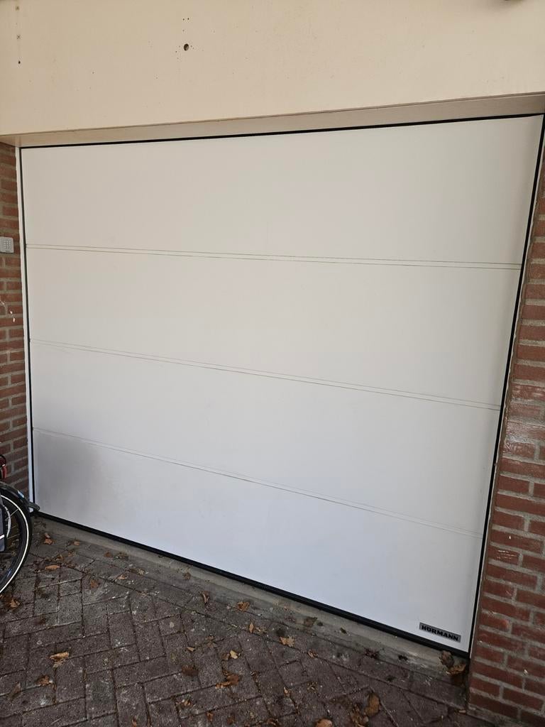 Elektrische Hörmann sectionale garagepoort, Ophalen, Garagedeur, Zo goed als nieuw, 120 cm of meer