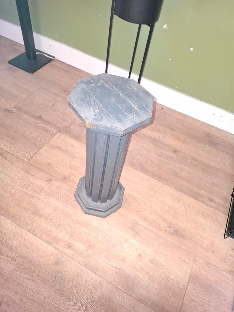 houten zuil, Ophalen