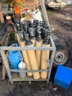 21 gasflessen, stikstof, Ophalen