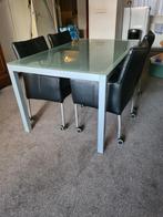 Glazen eettafel met 4 leren stoelen op wieltjes (gratis), Huis en Inrichting, Ophalen
