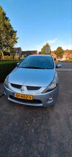 Mitsubishi Grandis 2.4 Mivec 7 AUT 2006 Grijs, 7 stoelen, 10 km/l, 570 kg, Particulier