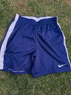 Nike donkerblauw sportbroekje mt. 158 (kindermaat L), Ophalen, Zo goed als nieuw, Sport- of Zwemkleding