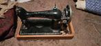 Antieke naaimachine, Ophalen