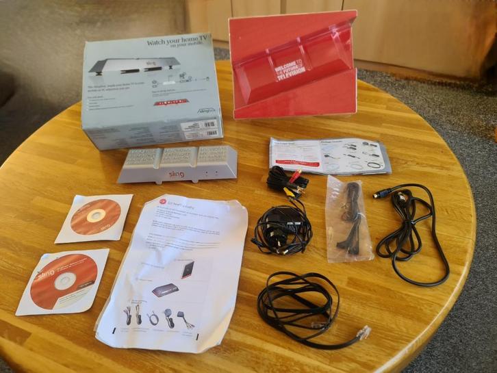 Slingbox. Overal TV kijken: op andere TV, laptop of mobiel, Computers en Software, Laptopstandaarden, Ophalen of Verzenden