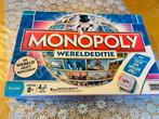 Te koop  een bordspel Monopoly Wereldeditie, Hobby en Vrije tijd, Gezelschapsspellen | Bordspellen, Ophalen of Verzenden, Een of twee spelers