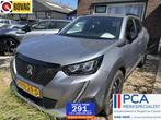Peugeot 2008 1.2 PureTech Allure 130 pk navigatie en camera, Voorwielaandrijving, Gebruikt, 1199 cc, Leder en Stof