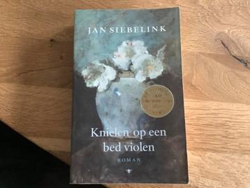 Knielen op een bed violen - Jan Siebelink beschikbaar voor biedingen