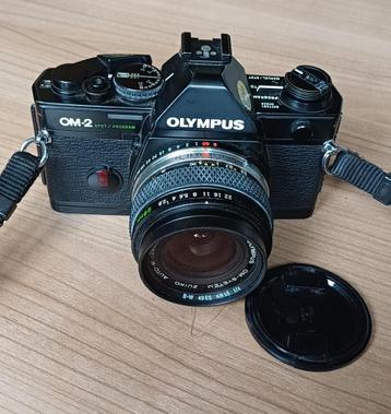 Olympus OM-2 analoge fotocamera met 2 mooie lenzen beschikbaar voor biedingen