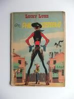 Lucky Luke en Phil ijzerdraad, Eén stripboek, Ophalen of Verzenden, Gelezen