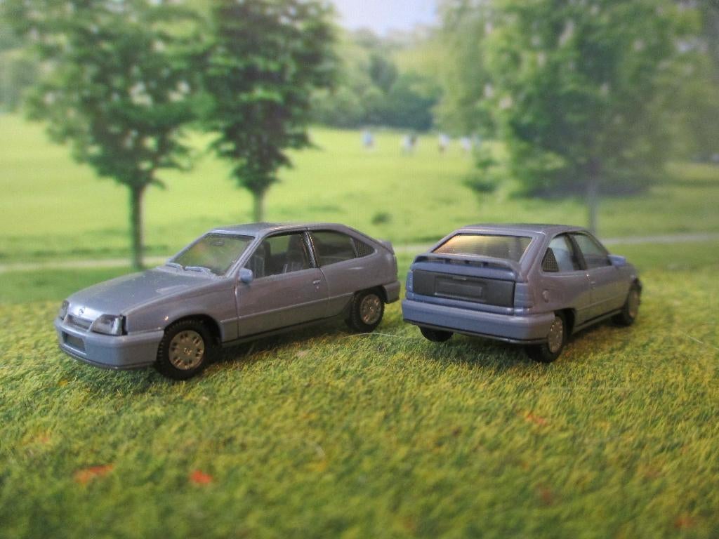 Opel Kadett E Gsi - Herpa blauwgrijs, Hobby en Vrije tijd, Ophalen of Verzenden, Zo goed als nieuw, Auto, Herpa