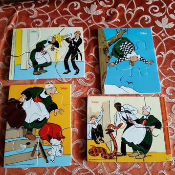 4 puzzels van Becassine in houten kistje franse stripfiguur beschikbaar voor biedingen