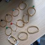 12 bolletjes armbandjes, doe een leuk bod, Gebruikt, Ophalen of Verzenden