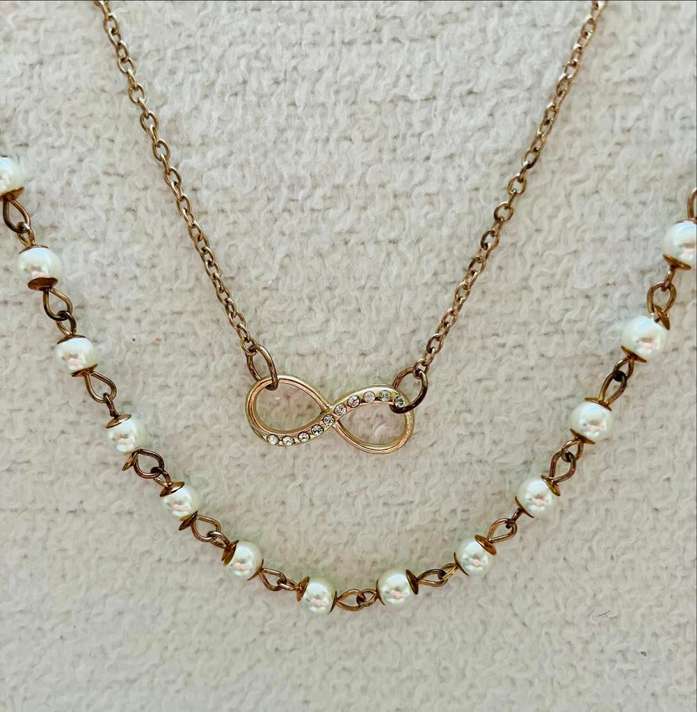 Pierre Cardin vintage dubbele ketting met Infinity hanger, Sieraden, Tassen en Uiterlijk, Kettingen, Zo goed als nieuw, Overige materialen