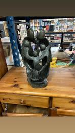 Stenen Familie Sculptuur, Ophalen