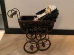 Antieke poppenwagen met pop, Ophalen of Verzenden