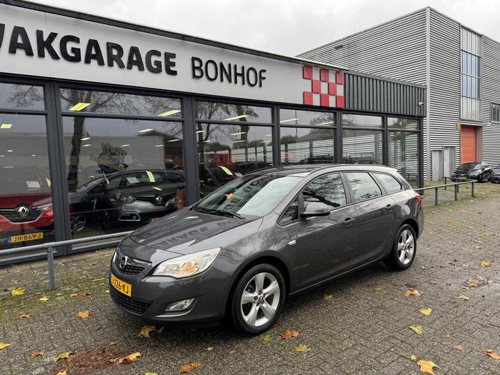 Opel Astra Sports Tourer 1.4 Edition AIRCO-CRUISE (bj 2011), Auto's, Opel, Te koop, Astra, ABS, Airbags, Airconditioning, Alarm