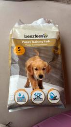 Puppy trainingspads, Ophalen