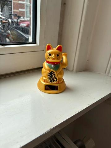 Chinees katje op zonne-energie beschikbaar voor biedingen