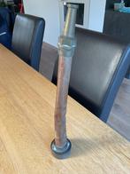 Antieke koperen spuitmond, Ophalen