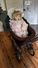 Antieke porseleinen pop en kinderwagen, Antiek en Kunst, Antiek | Speelgoed, Ophalen of Verzenden