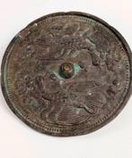 Bronzen sjamaanspiegel, Ophalen